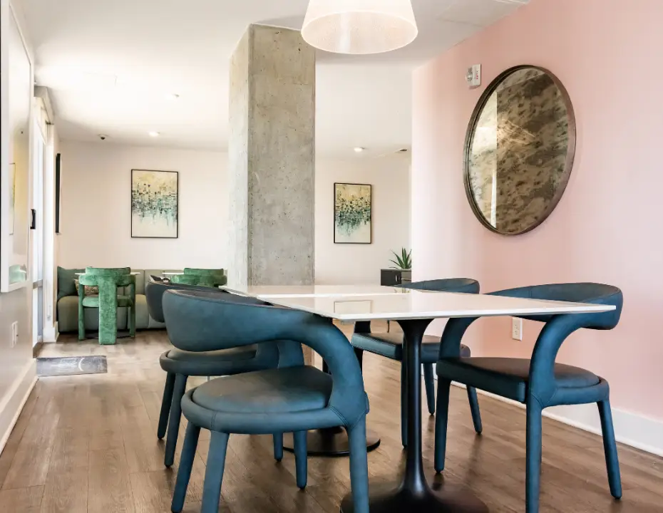 Collaborative study lounge with modern table seating, contemporary décor, and open gathering space.